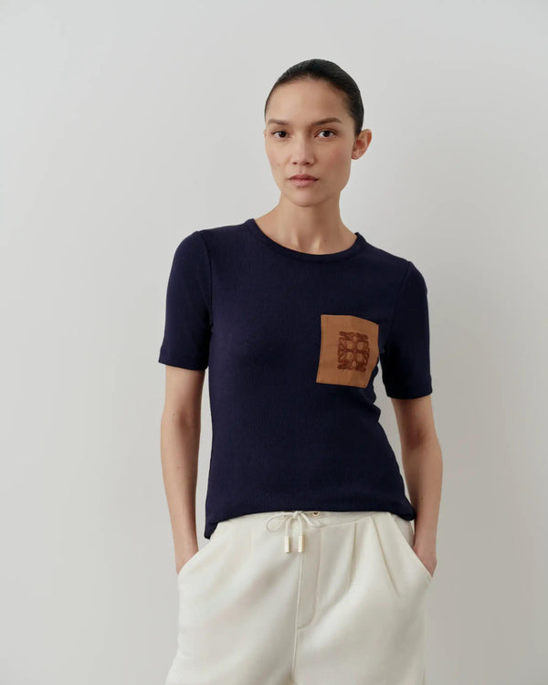 Emello Ribbed Pocket Tee in Navy, featuring clean lines and tonal chain-stitch embroidery on a chest pocket.