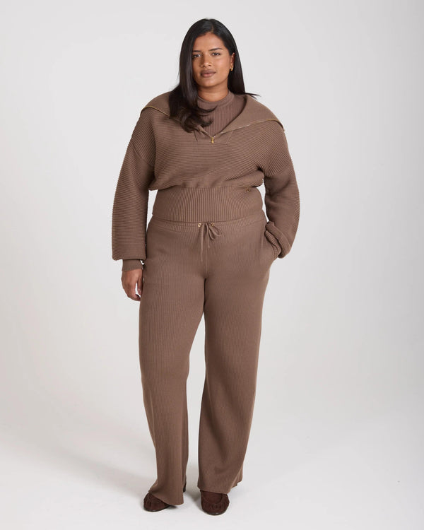 Sorella Ribbed Half Zip Jumper - Taupe, featuring a relaxed fit and gold embellishments.