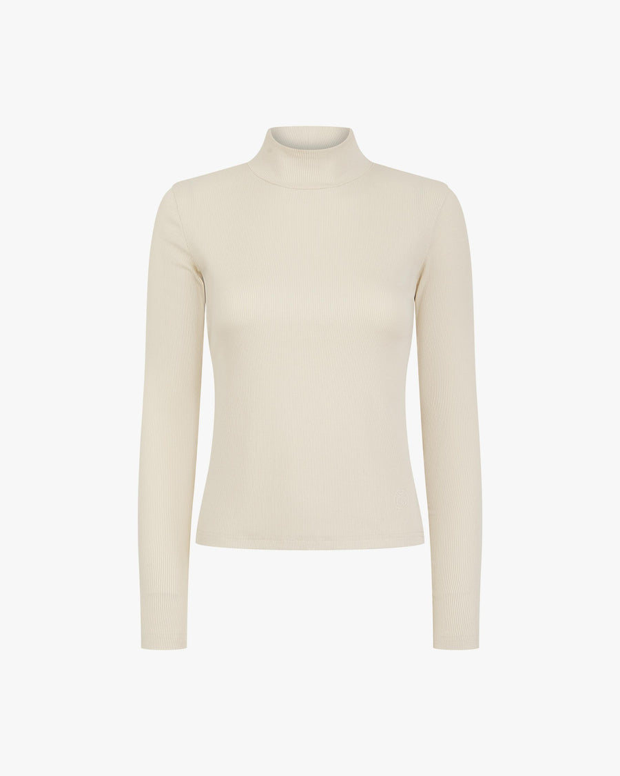Elegant beige ribbed turtleneck in lyocell-cotton from Emello, showcasing tactile refinement and luxurious comfort.