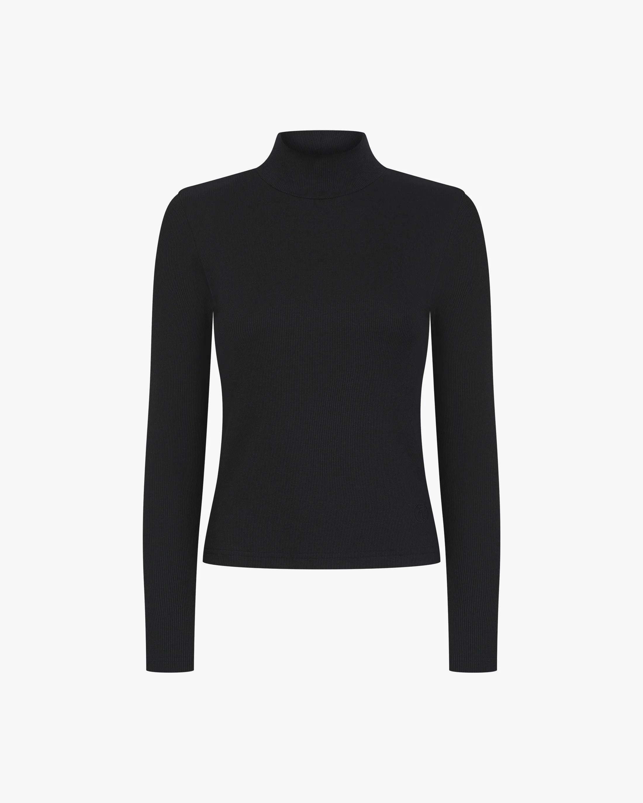 Black ribbed turtleneck top made from lyocell-cotton with an embroidered badge.