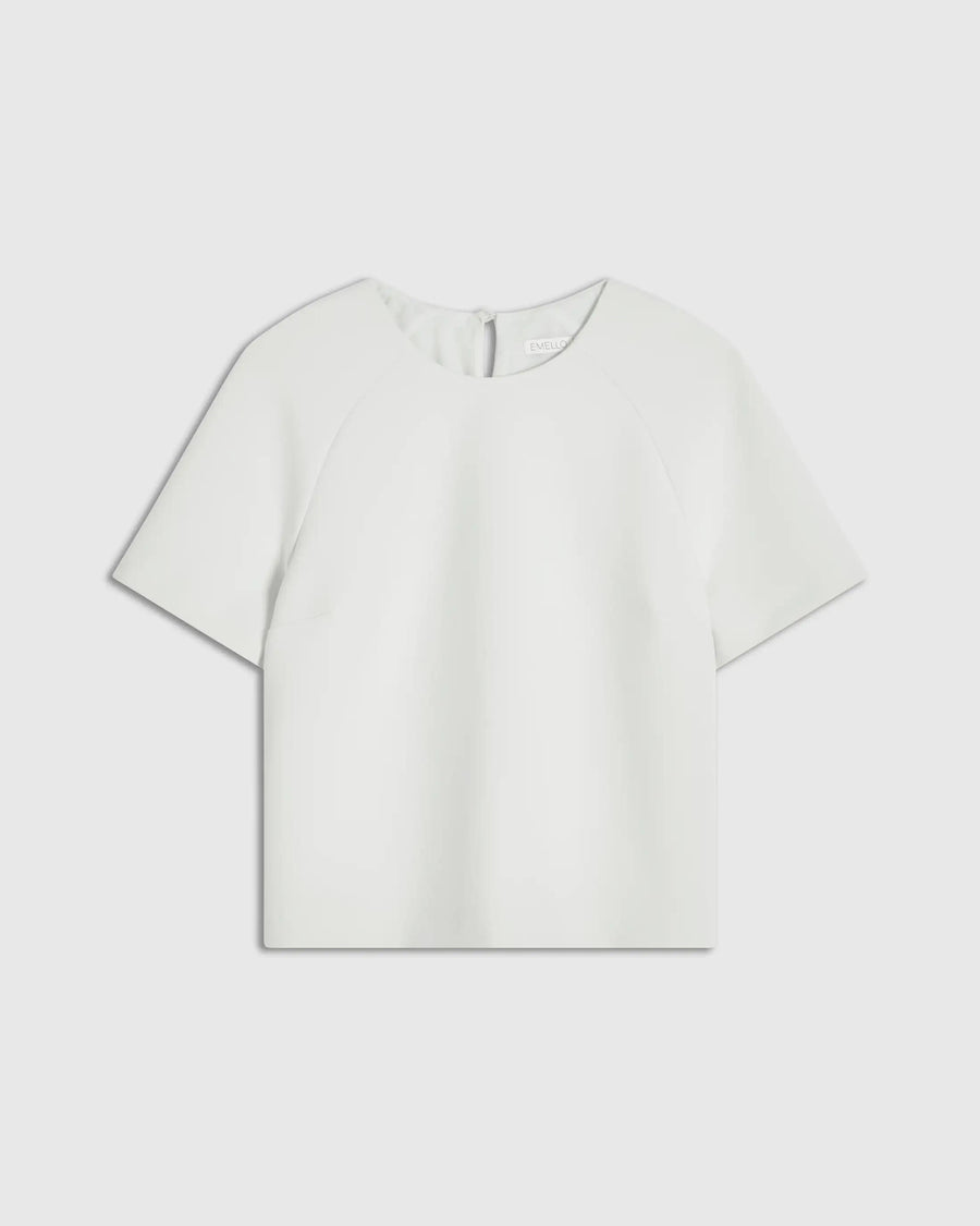 Mist green structured short sleeve top with sculptural silhouette by Emello, featuring seamless edges and raglan sleeves.