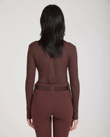 Back view of woman wearing Emello Forma Super Soft Sculpting Leggings with Belt Loops in Chocolate.
