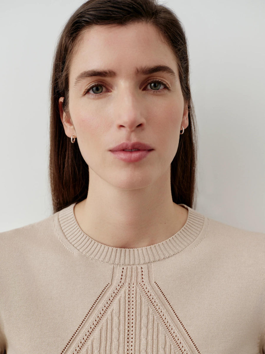 Emello Silk Blend Pointelle Sweater in neutral beige, showcasing intricate geometric pattern.
