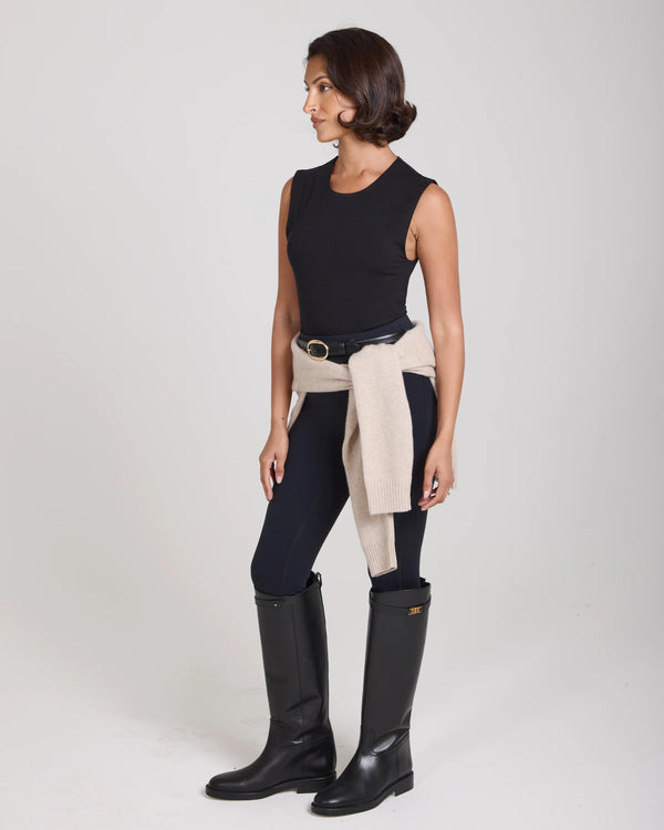Elegant model wearing the Emello Forma Silky Lyocell Jersey Double-Layer Vest in black, showcasing a refined and poised style.