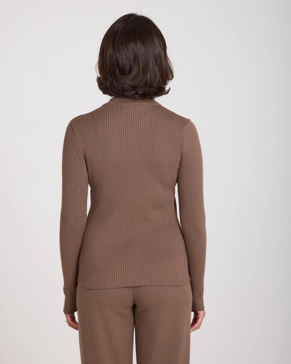 Back view of the Sorella Ribbed Zip Through Cardigan in taupe, showcasing a slim fit and soft ribbed texture.