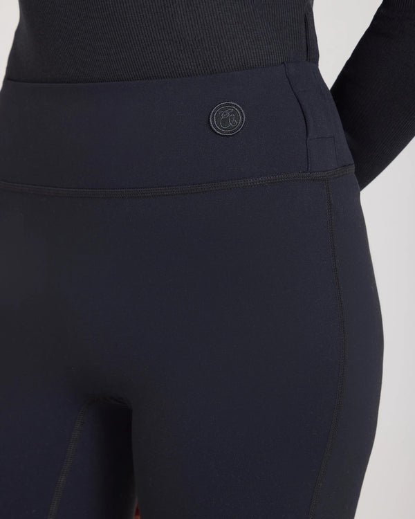 Forma Super Soft Sculpting Leggings in Black with belt loops and embroidered logo badge on waistband.