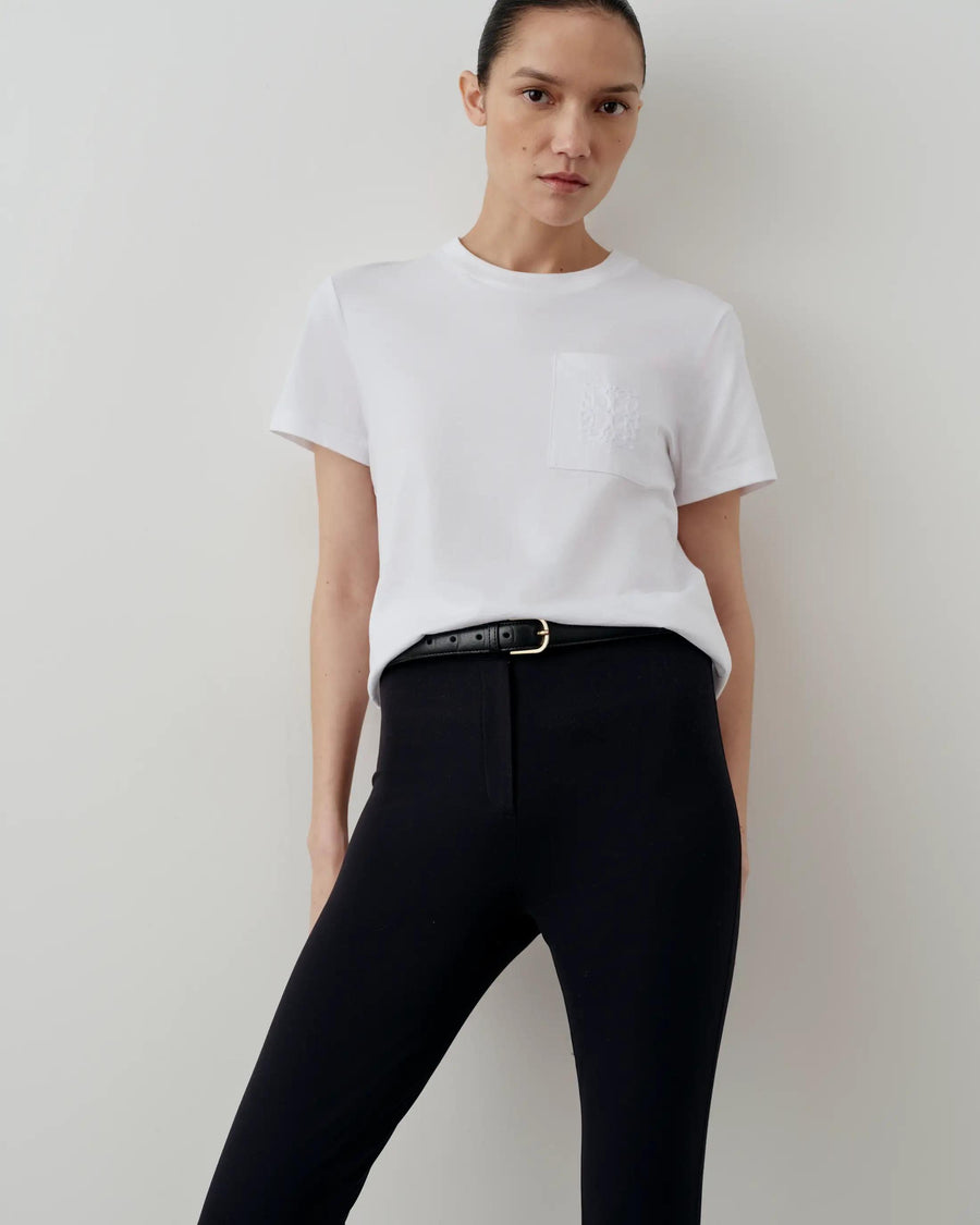 Supima Cotton Pocket Tee in white, featuring Emello's signature mirror chain-stitch embroidery on the pocket.