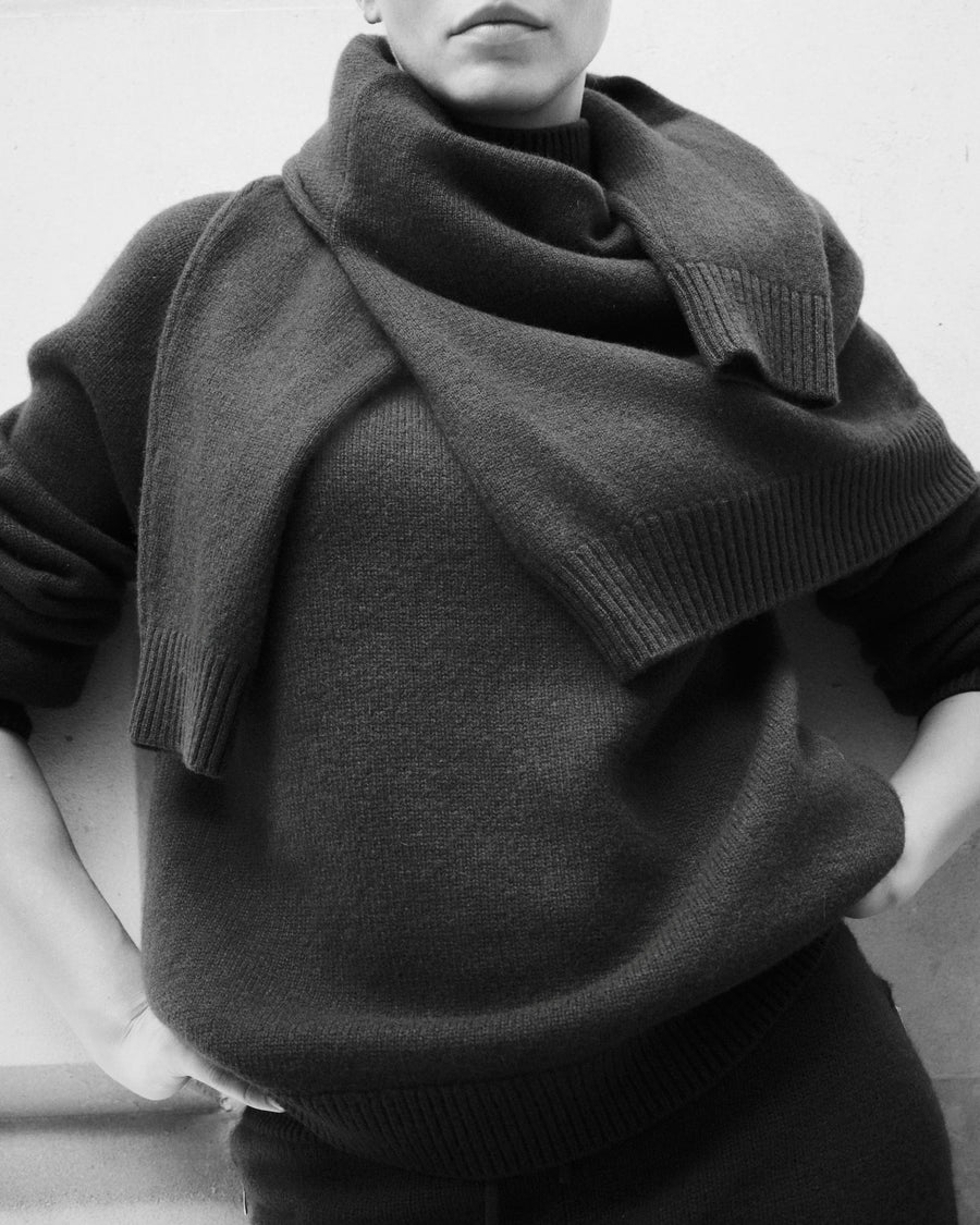 Beige high-neck sweater in merino wool-cashmere with gold hardware, featuring oversized fit and elegant draping.