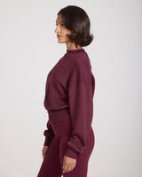 Fig sweatshirt with debossing in buttery-soft lyocell fleece worn by model, side profile showing relaxed fit.