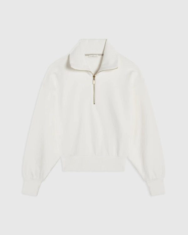 Cream funnel-neck sweatshirt by Emello with a half-zip opening.