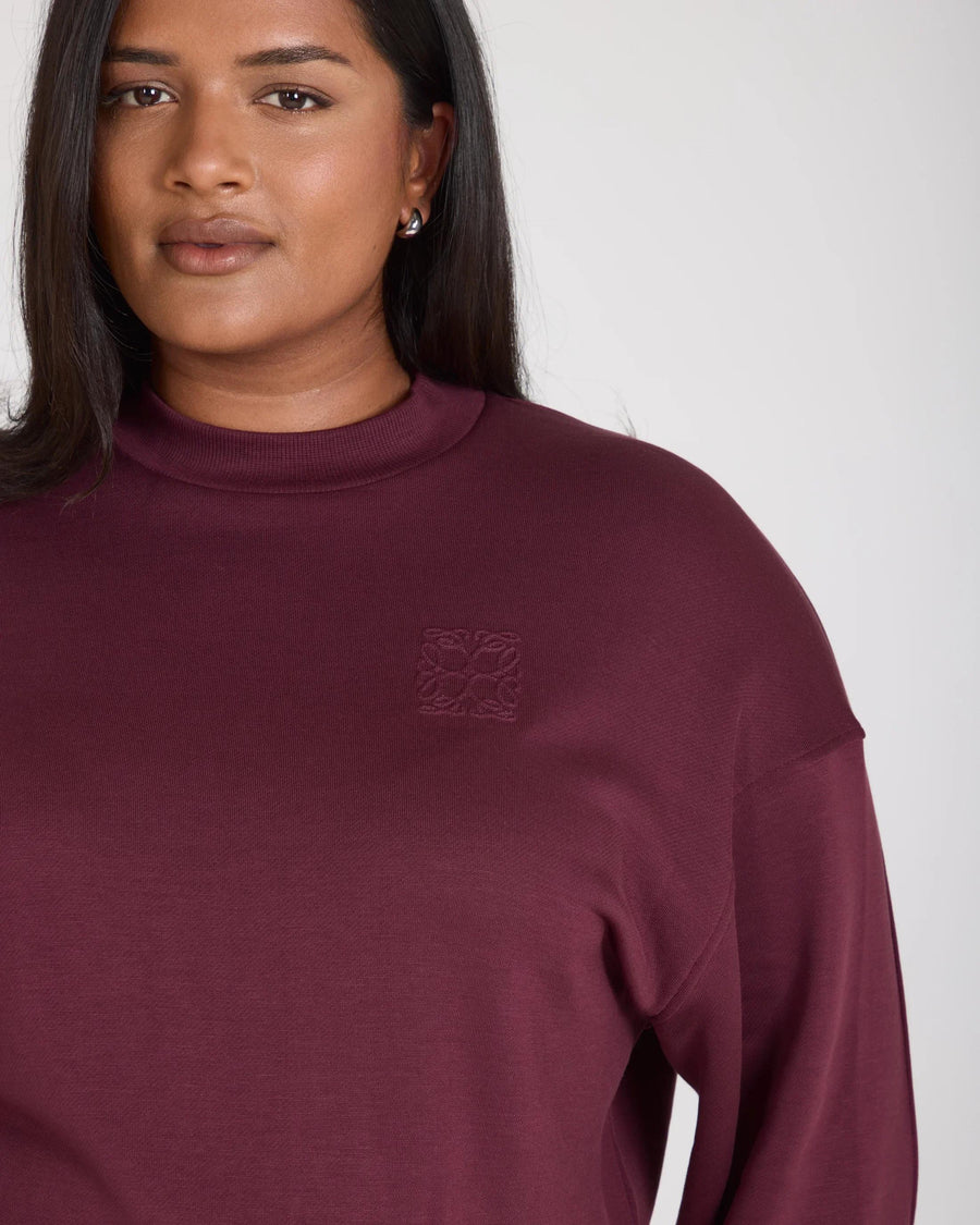 Emello women's purple sweatshirt with debossed detail in soft lyocell, featuring a relaxed fit and crew neck.