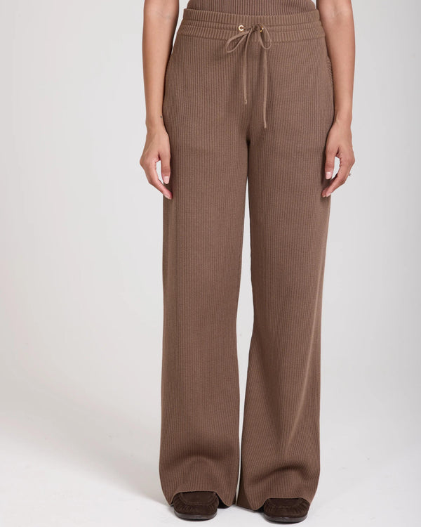 Sorella Ribbed Knit Wide Leg Trousers in Taupe, featuring a relaxed, full-length wide leg and gold-finish branded details.