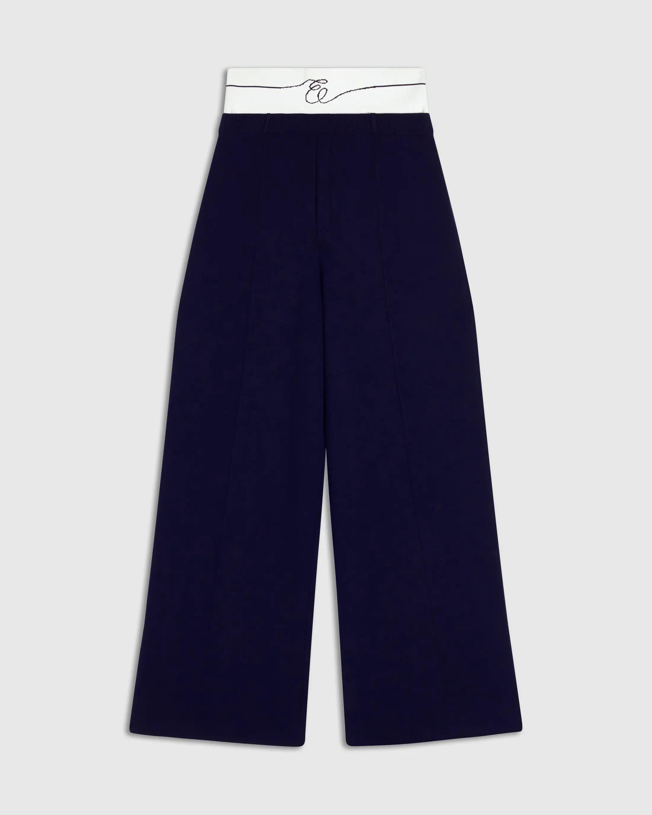 Double Waistband Knitted Trousers in Navy, showcasing wide-leg design and refined tailoring.