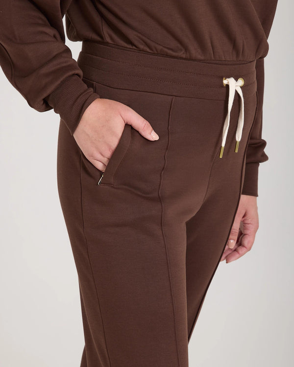Mello Lyocell Fleece Wide Leg Pants in Chocolate with gold accents, showcasing refined structure and tactile elegance.