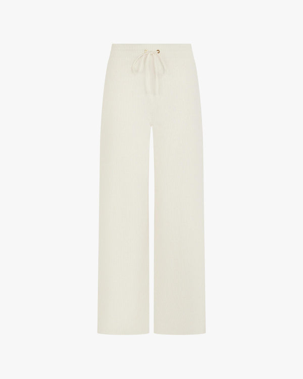 Cream ribbed wide-leg trouser in cotton-cashmere with gold hardware.