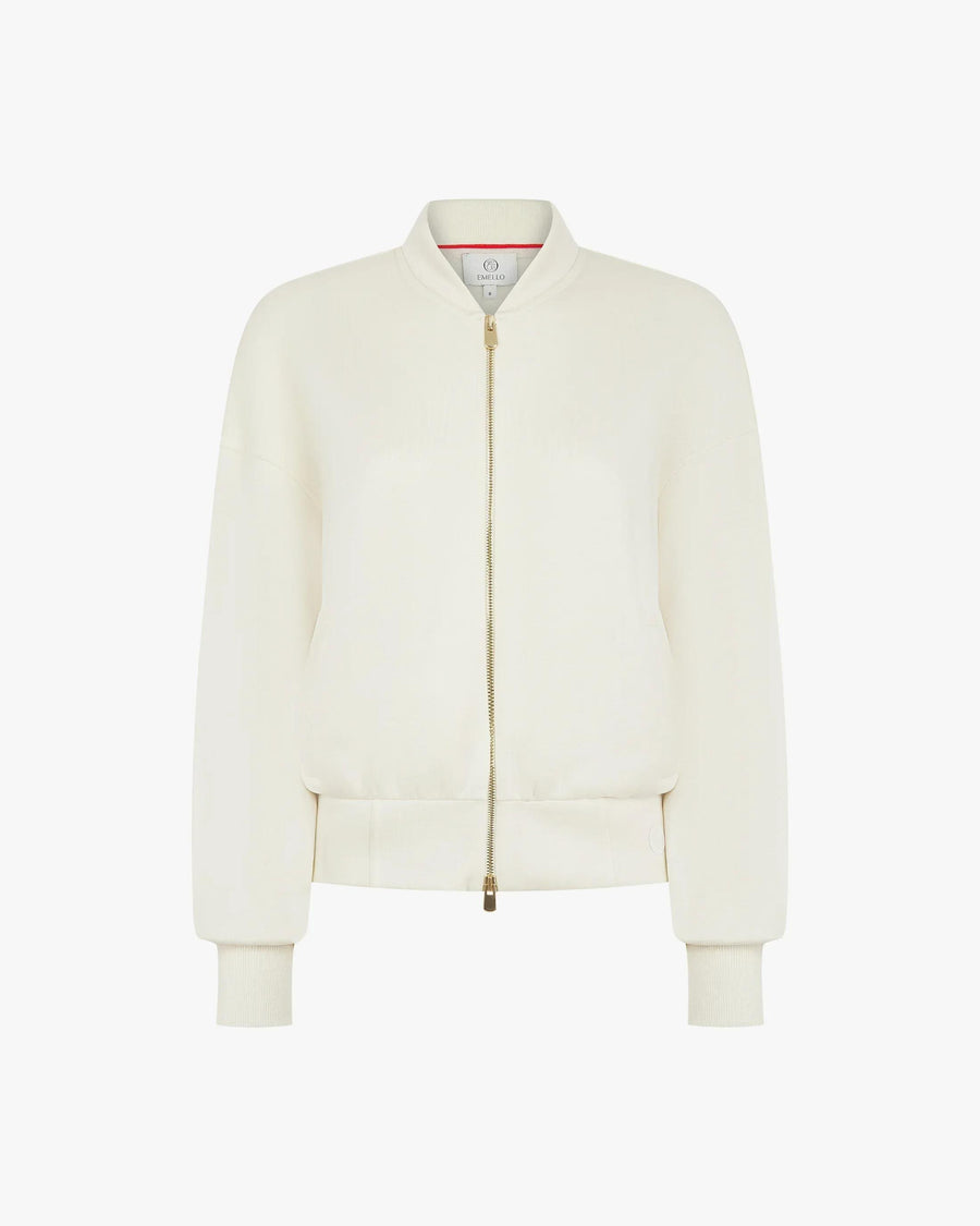 Cream zip-through jacket in buttery-soft lyocell fleece with gold hardware.